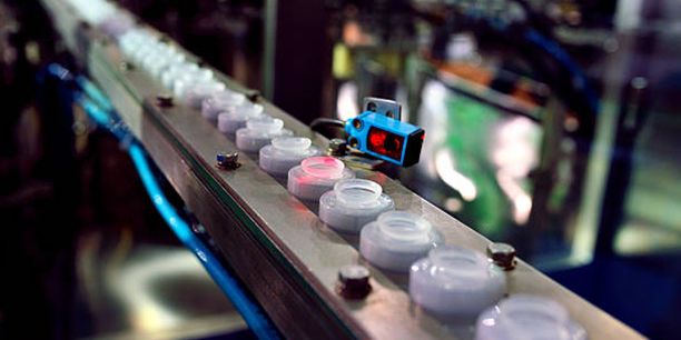 Industrial internet of things, innovative manufacturing and smart industry: human machine interface app on a digital tablet